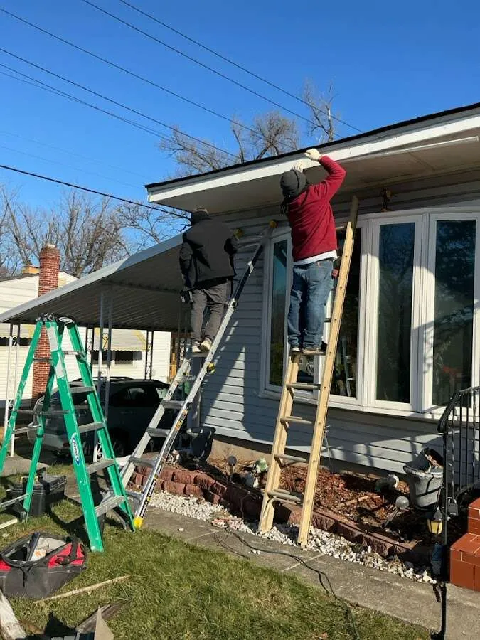 Restoration crew performing exterior repair in Muskegon Heights